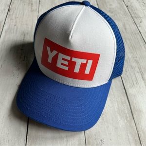 NEW WITH TAGS YETI LOGO TRUCKER HAT RED WHITE BLUE ADJUSTABLE SIZE MENS